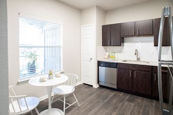 Eat-in kitchen table with sink